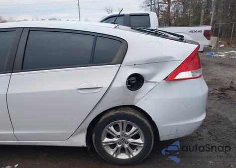 2010 Honda Insight Ex z USA, uszkodzony, nr VIN JHMZE2H79AS028650